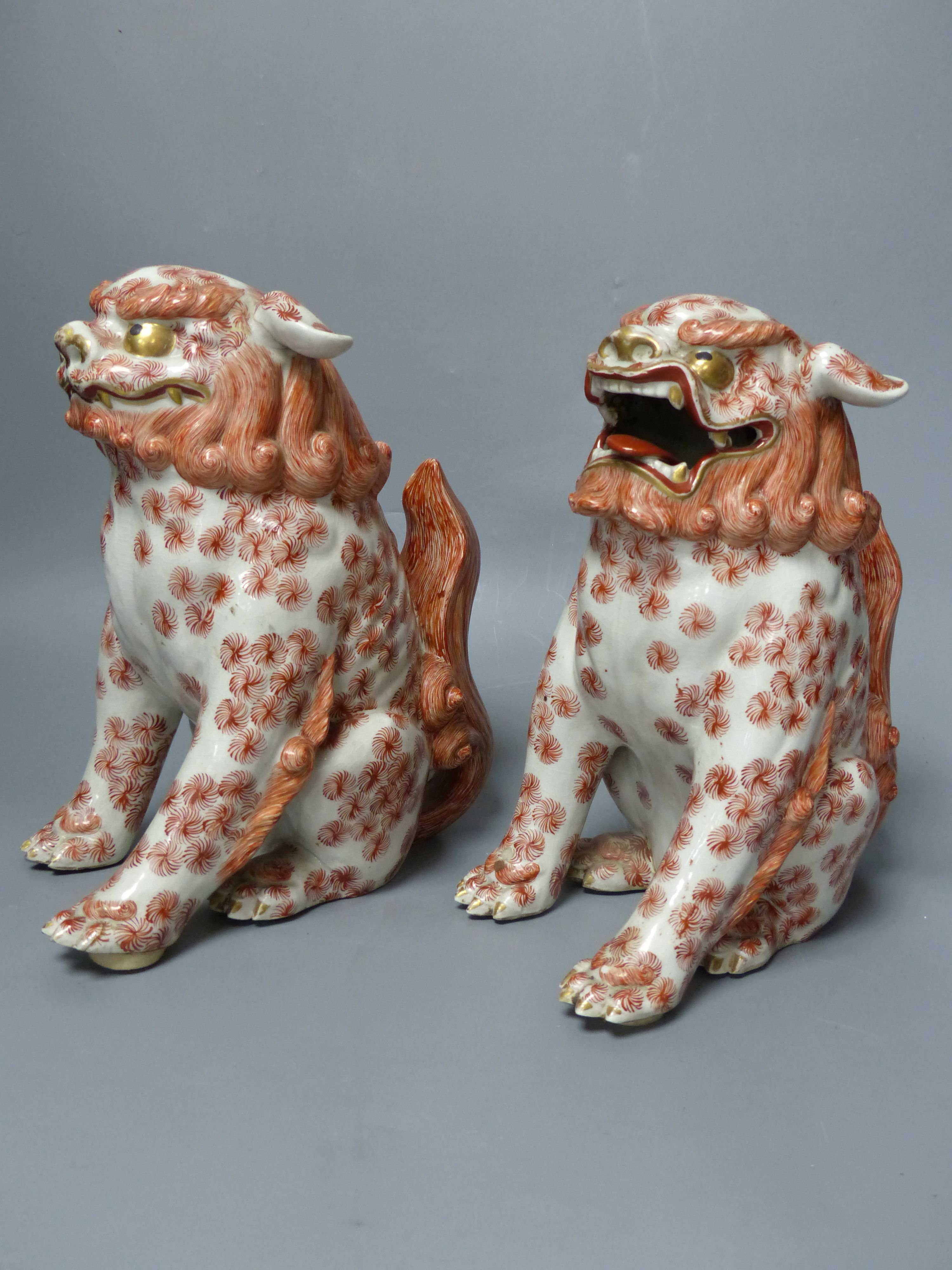 A pair of Japanese Kutani shi-shi (lion dogs), Meiji period, height 23cm